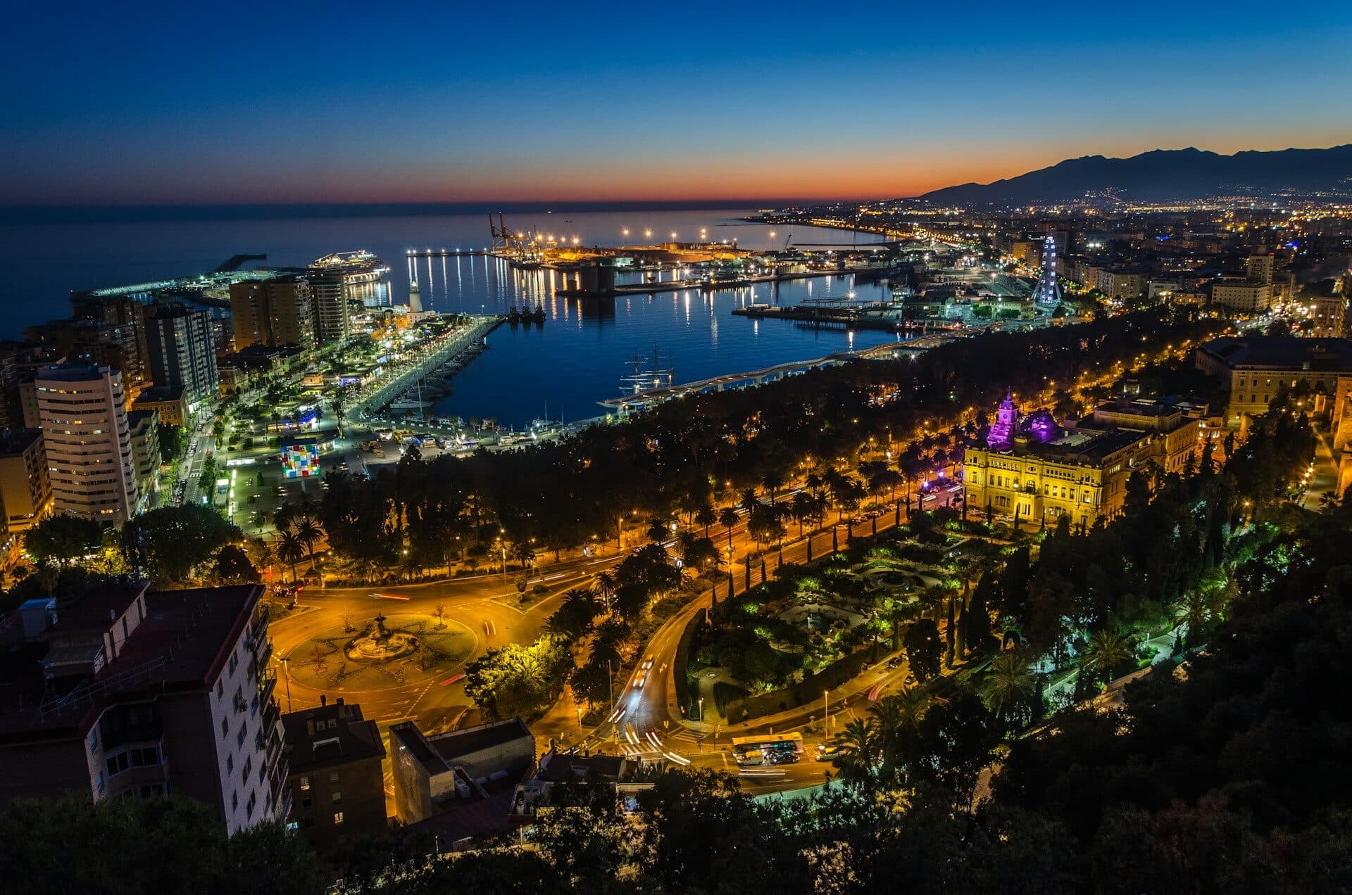 Evening panoramic view of Malaga city and port